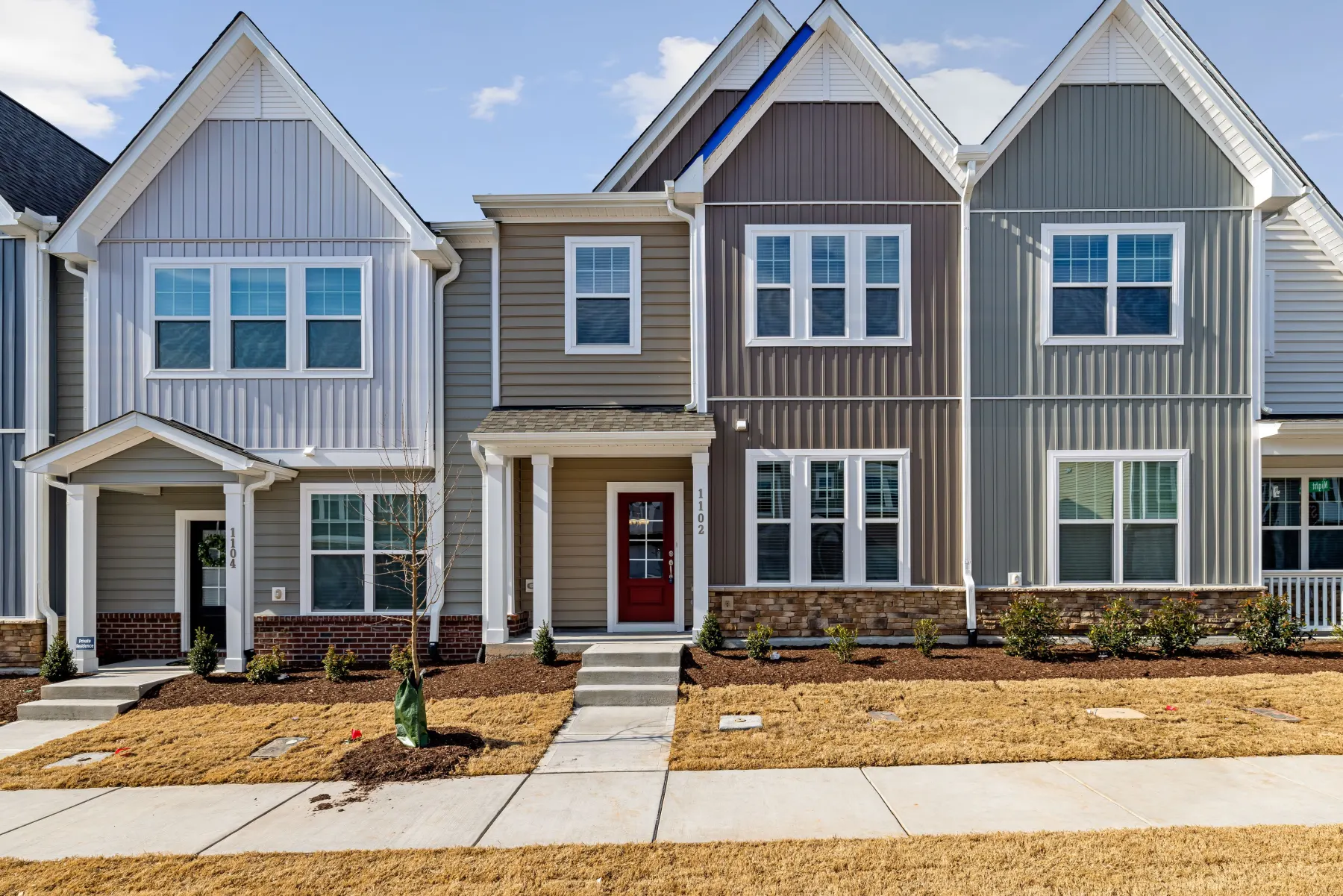 Newer two-story attached workforce housing with durable exterior materials